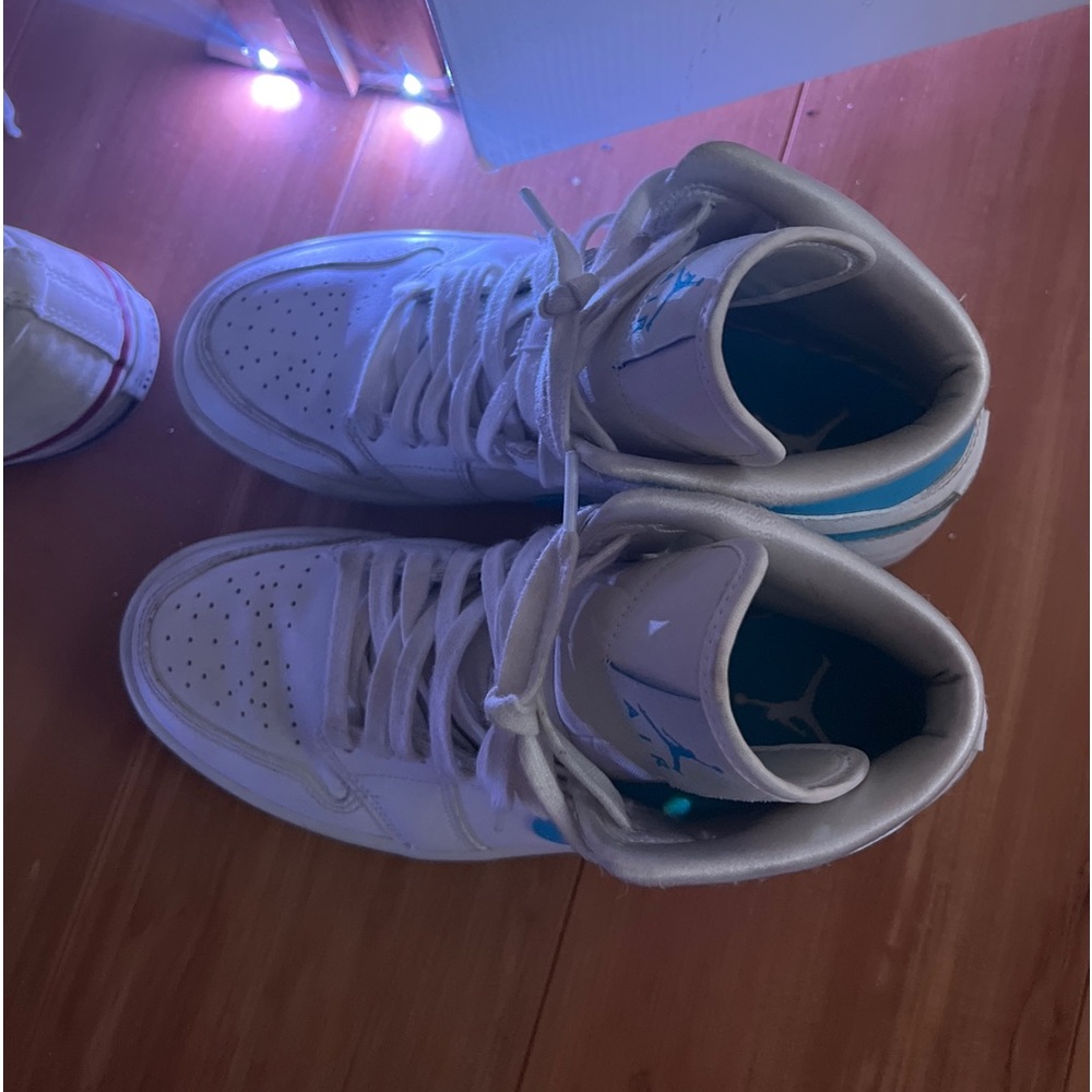 nike blue and white air jordan’s